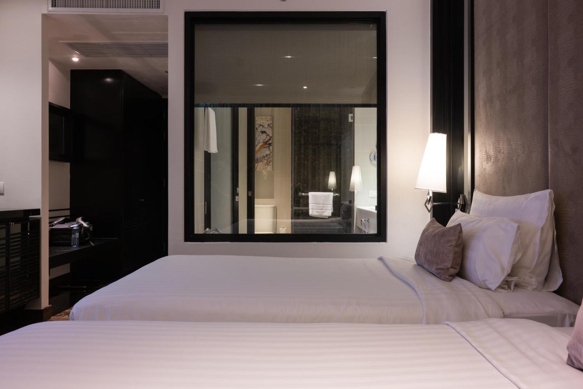 Moevenpick Hotel Sukhumvit 15 Bangkok Exterior foto Deluxe Room